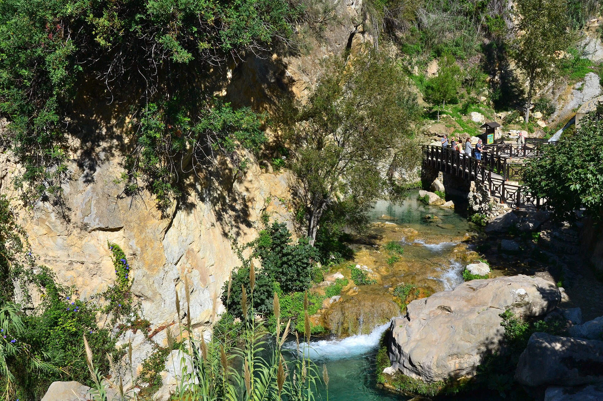 Wooden walkway over the Algar river at the Fonts de l'Algar waterfalls
